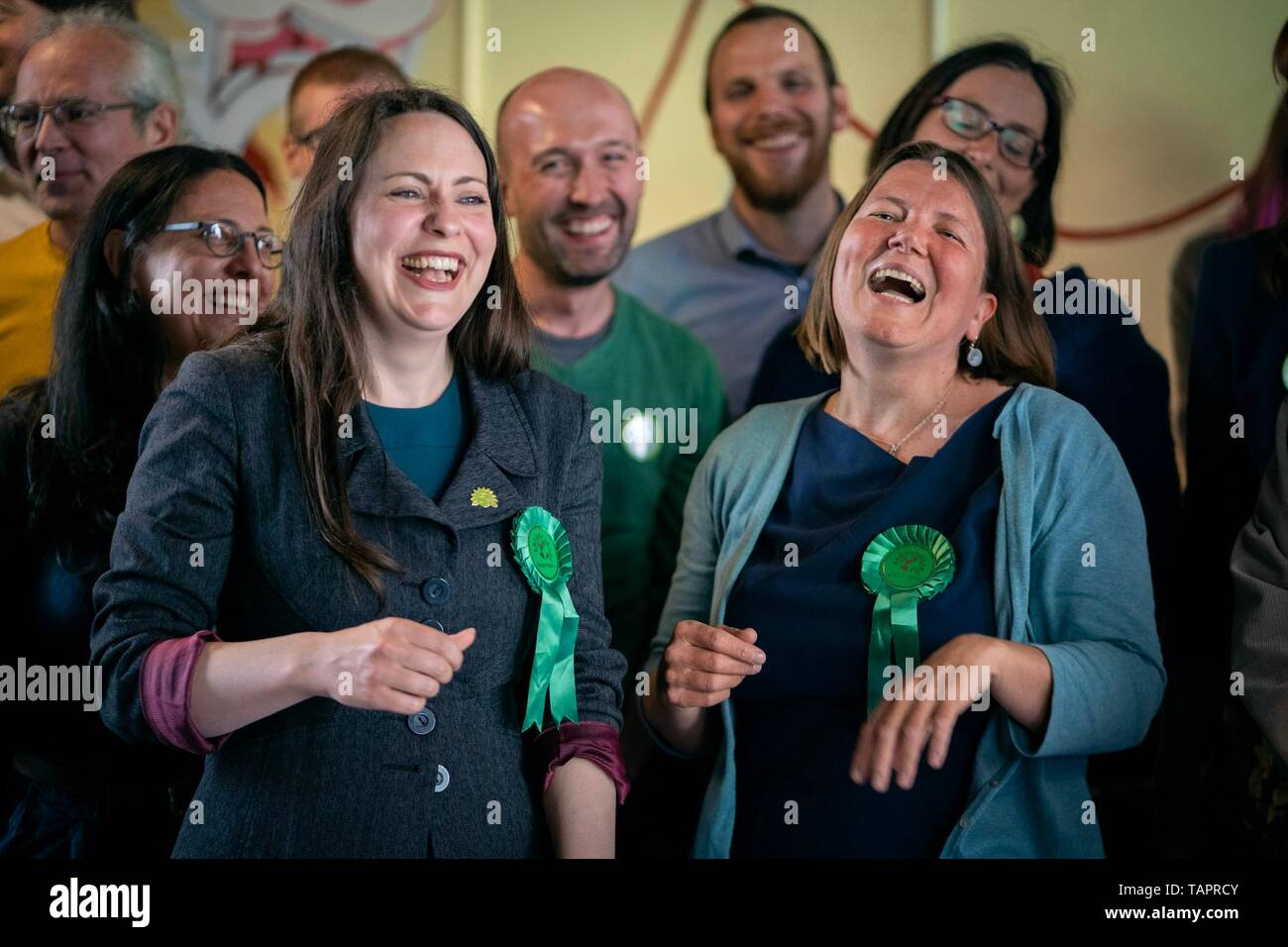 Birmingham, UK. 27th May, 2019. Green Party deputy leader Amelia Womack (center left) joins new West Midlands MEP Ellie Chowns (center right) and members from across the West Midlands in Birmingham celebrate the results of the EU election that saw Greens rise from three to seven seats in England. Credit: Vladimir Morozov/Alamy Live News Stock Photo