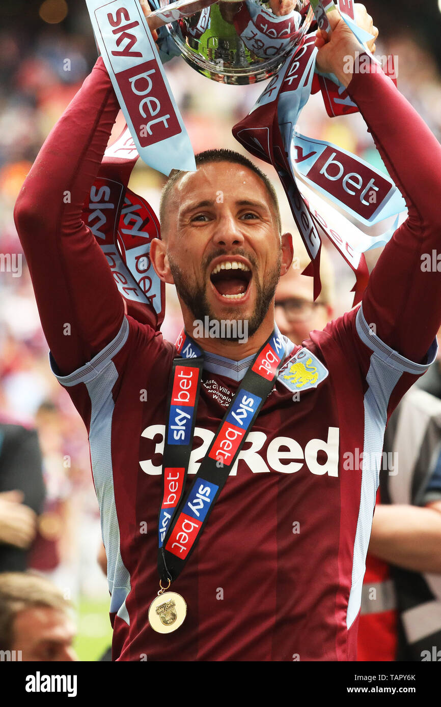London, UK. 27th May, 2019. Conor Hourihane (14) of Aston Villa holds the play off trophy following his sides win during the Sky Bet Championship Play Off Final between Aston Villa and Derby County at Wembley Stadium, London on Monday 27th May 2019. (Credit: Tim Markland | Credit: MI News & Sport /Alamy Live News Stock Photo