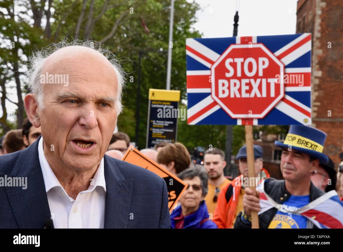 London, UK. 27th May 2019. Vince Cable was joined by activists and the three new MEPs for London to celebrate the best ever European Election result in the Party's History.  Pictured : Vince Cable with SODEM's Steve Bray in the backround. Lambeth Palace Road, London Credit: michael melia/Alamy Live News Stock Photo