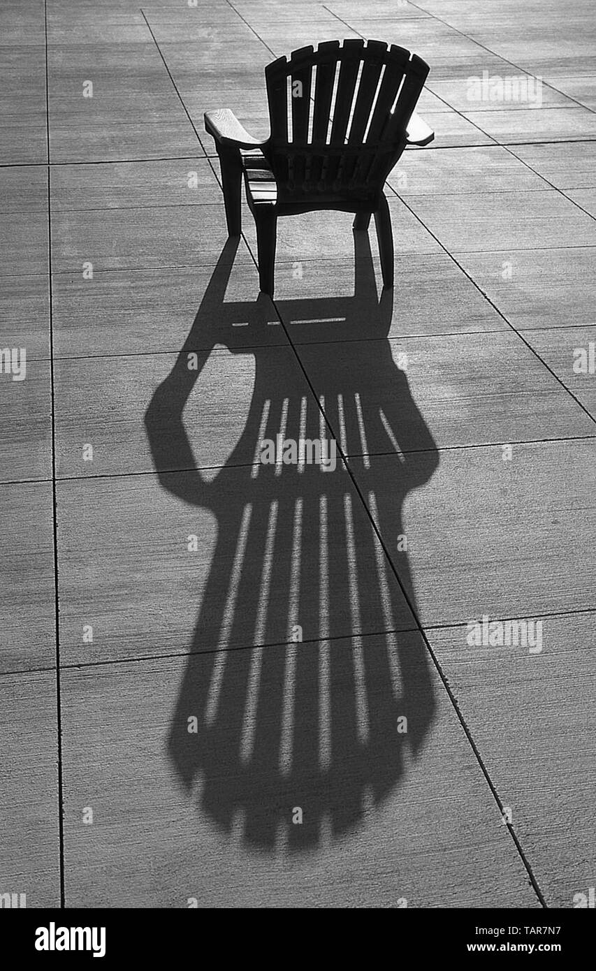 Chair and shadow Stock Photo - Alamy