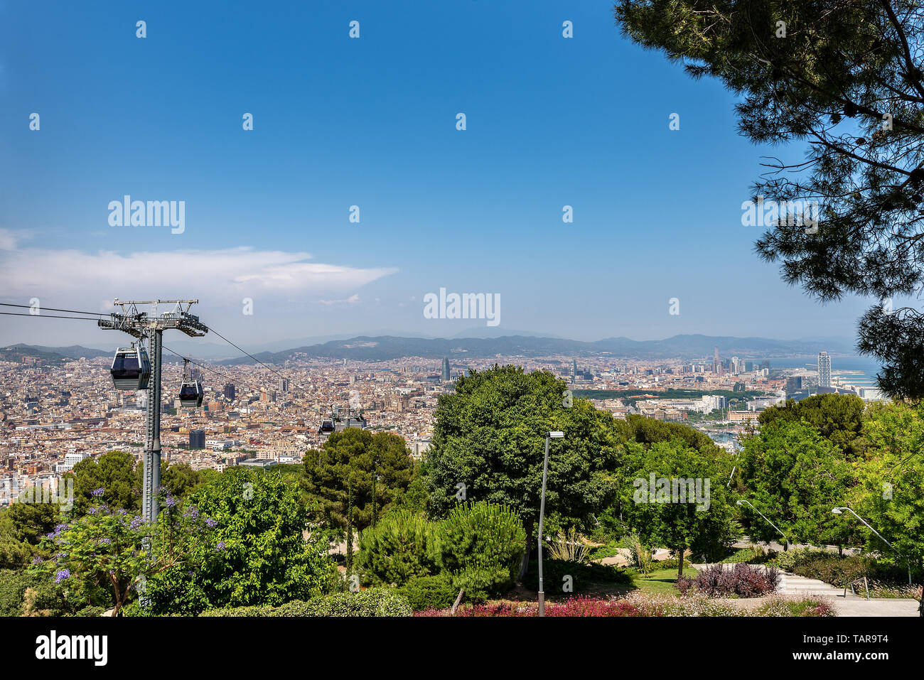 Aerial view of Barcelona from the Montjuic hill with the overhead cable ...