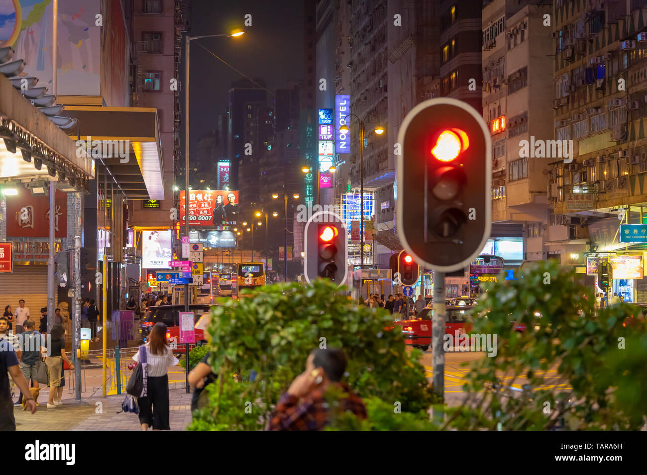 Hong Kong, Hong Kong - October 16, 2018: People are traveling in the night street of Nathan Road. Stock Photo