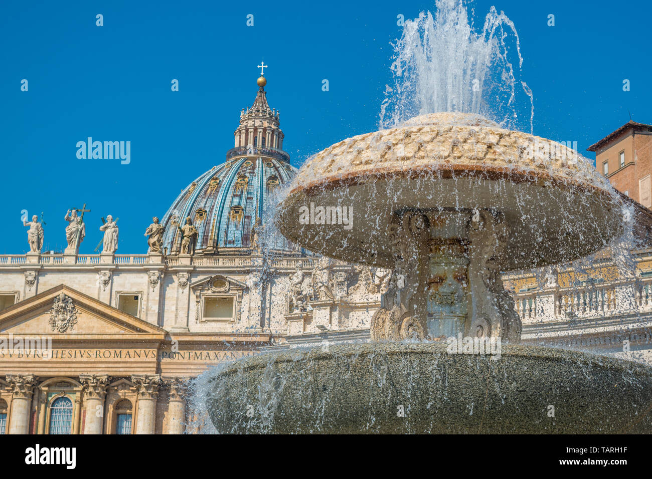 Bernini's Fountain and the Basilica of St. Peter in the Vatican Stock Photo