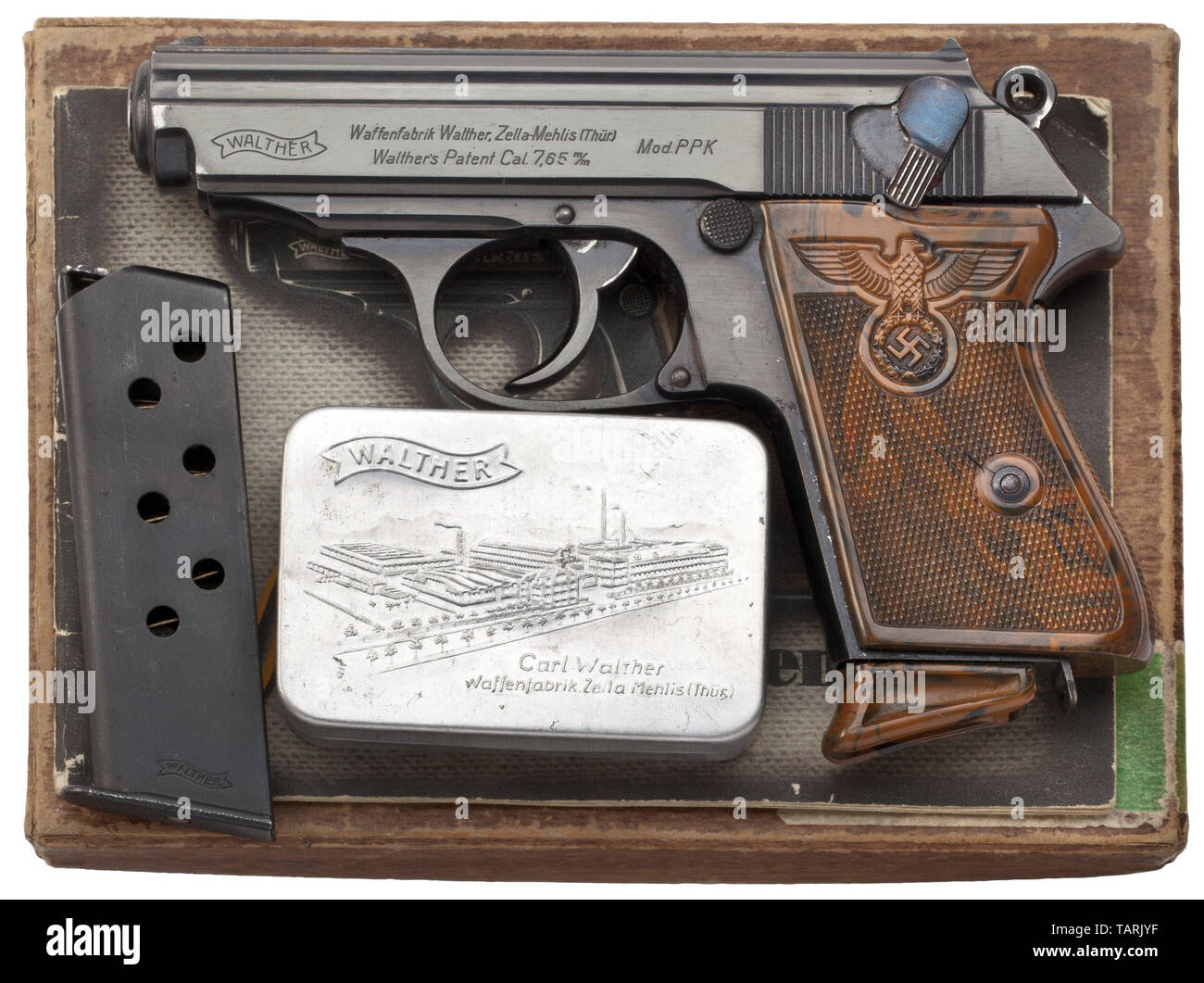 A Walther PPK ZM, PL 'Ehrenwaffe des Politischen Leiters', in matching-numbered original cardboard box, Cal. 7.65 mm, no. 238842K. Bore minimally rough in places, proof-marked crown/N. Original finish with minimal wear marks, partially minimally spotted. Small parts blued. Original, mottled brown plastic grip panels with large party eagle on either side. Correct magazine with extension. Comes with its original, matching-numbered cardboard box with original spare magazine, original instructions and aluminium tin for cleaning utensils, including co, Additional-Rights-Clearance-Info-Not-Available Stock Photo