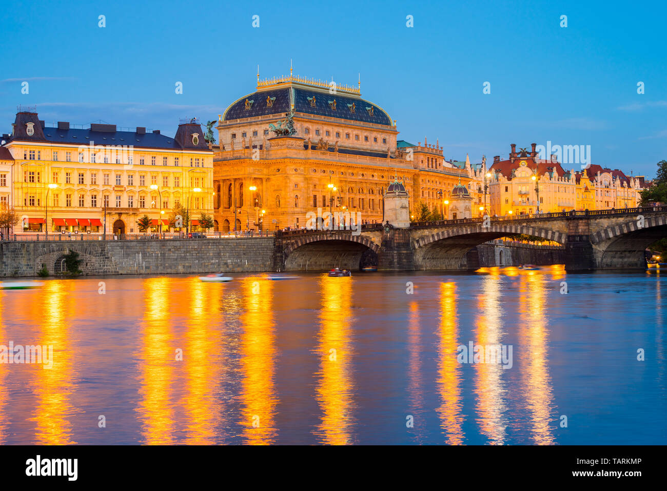 The National Theatre,  and River Vltava at dusk Prague Czech Republic Europe Stock Photo