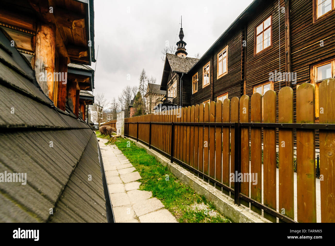 Zakopane, Krupowki str, , april, 11, 2019.  Construction School name of Wladyslaw Matlakowski near one of the most famoust street in capital of Polish Stock Photo