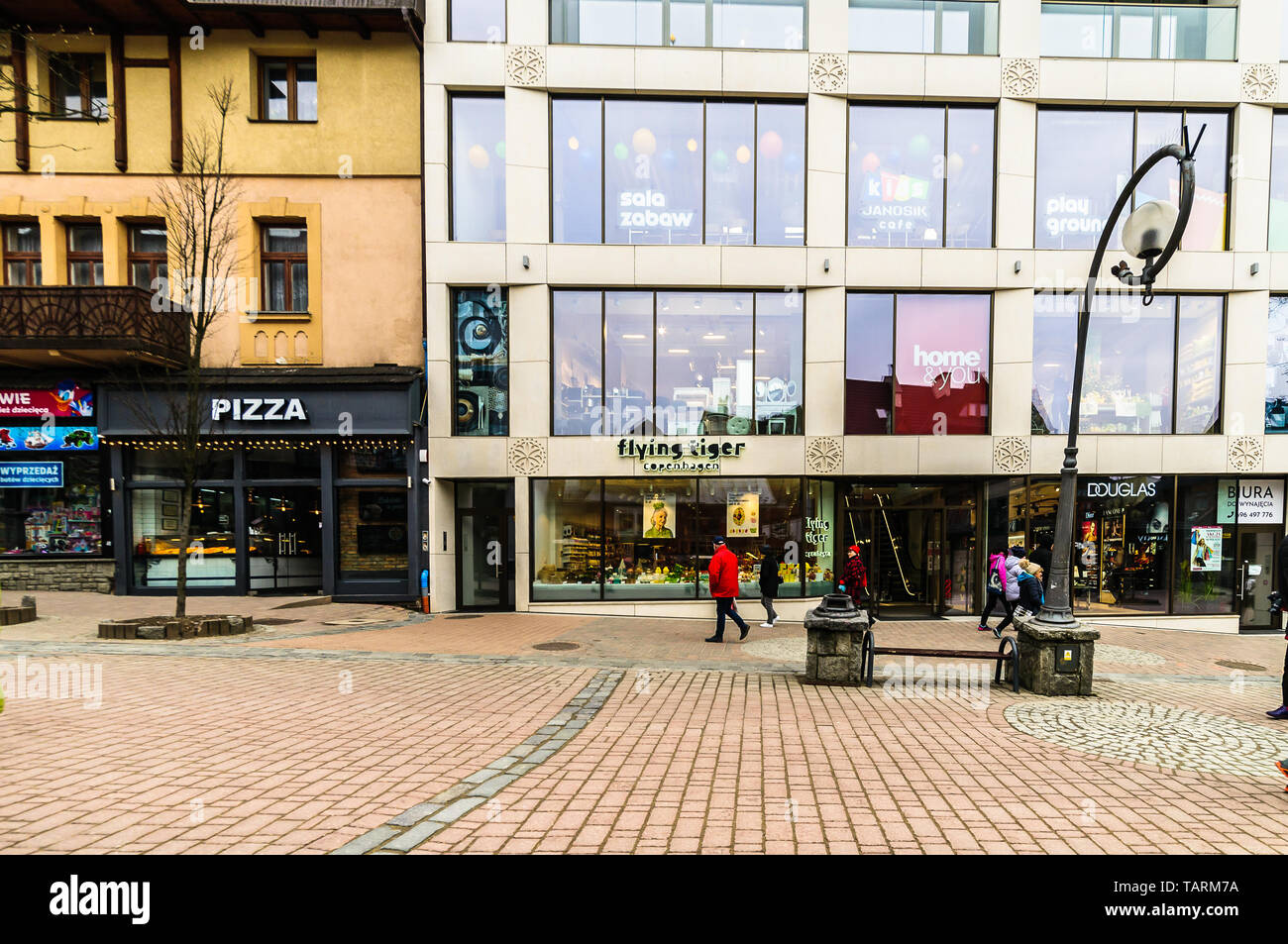 Zakopane, Krupowki str, , april, 11, 2019. Shop at on one of the most  famoust street in capital of Polish Tatras during cloudy day Stock Photo -  Alamy