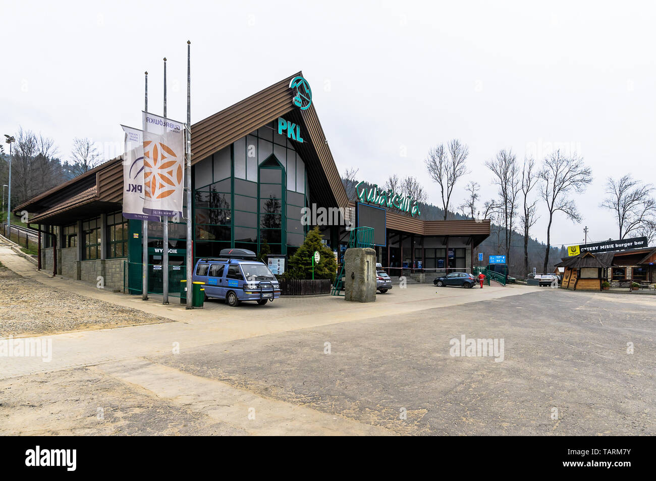 Zakopane, Krupowki str, , april, 11, 2019.  The lower station of the Gubałówka railway during cloudy day Stock Photo