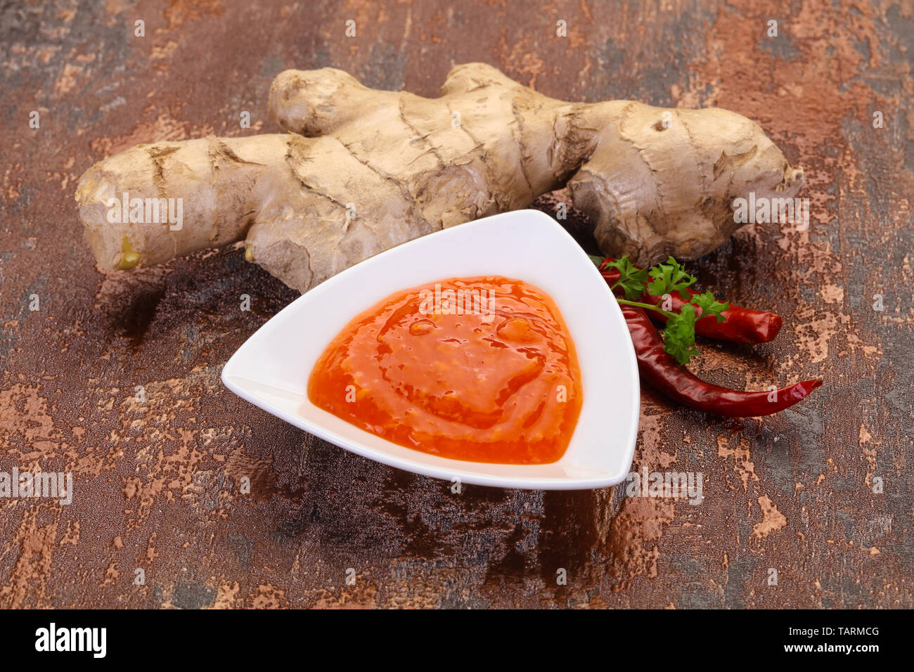 Ginger chili sauce with root and pepper Stock Photo - Alamy