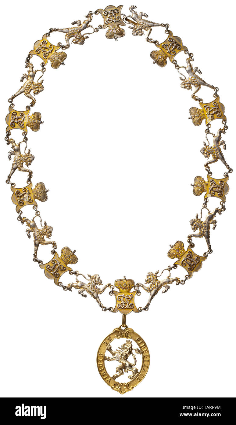 Order of the Golden Lion - an order's chain with jewel (ring), 20-piece chain made of gilt silver with alternating depictions of lions and shields with the monarch's monogram 'FL' (Fredericus Landgravius) for Frederick II Landgrave of Hesse, founder of the order in 1770. The monograms separately riveted. Attached is the gilt order jewel with year cypher 1770. 20th-century collector's reproduction of this order's chain that is rarely found in the original. medal, decoration, medals, decorations, badge of honour, badge of honor, badges of honour, b, Additional-Rights-Clearance-Info-Not-Available Stock Photo