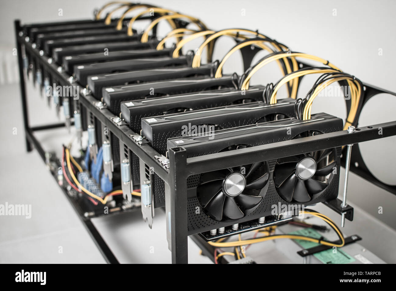 Mining Rig Machine for Cryptocurrency Using Powerful Computer Graphic Cards Stock Photo