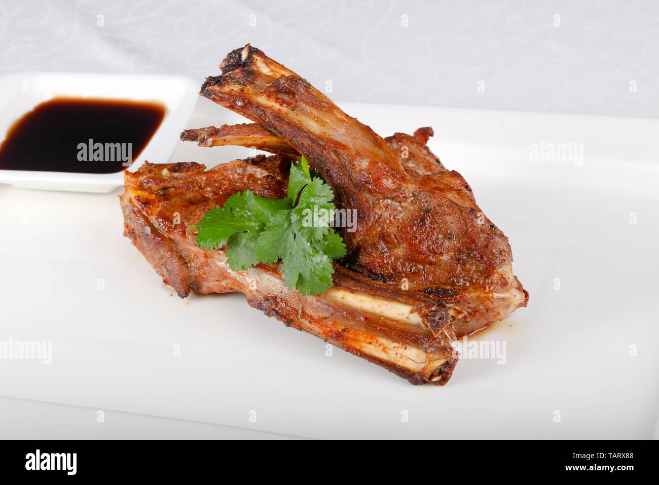 Roasted lamb with coriander leaves Stock Photo Alamy
