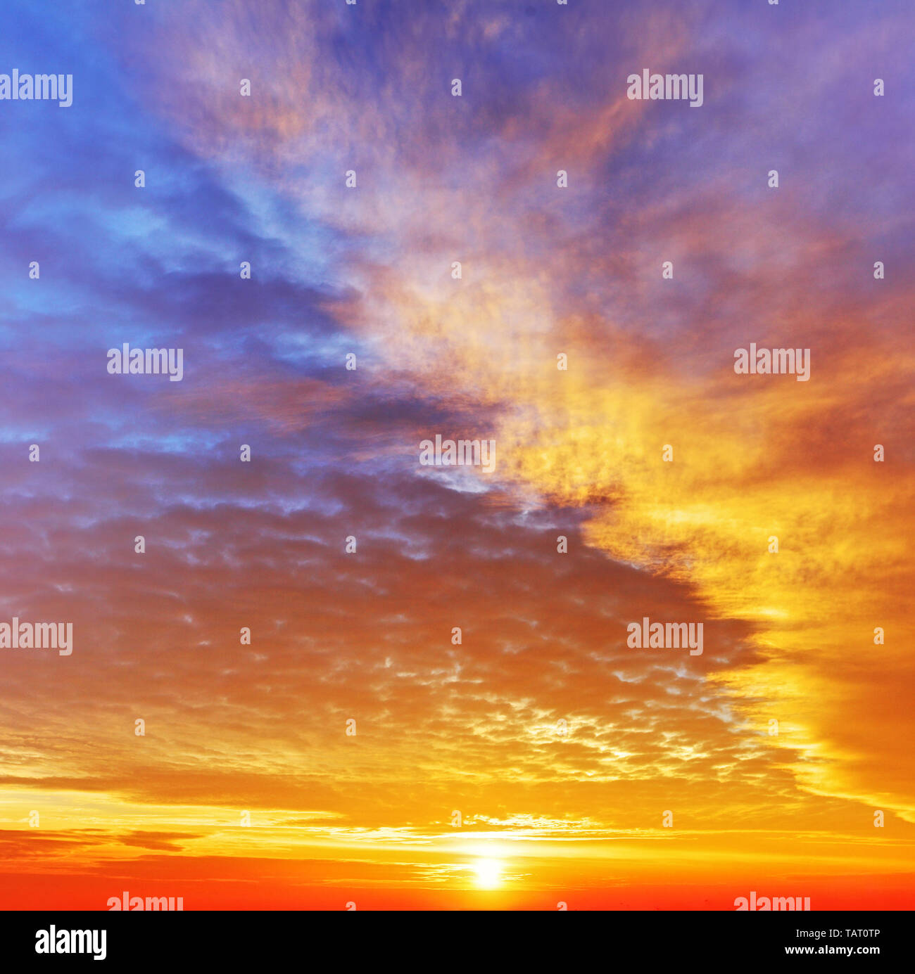 Sky with dramatic cloudy sunset and sun Stock Photo - Alamy