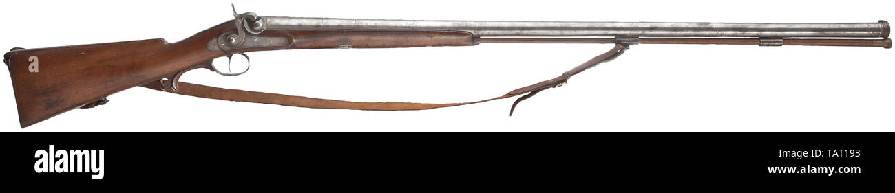 An English percussion rifle with Ottoman barrel, mid-19th century, Round, smooth Damascus barrel in 20 mm calibre with cannon muzzle and iron front sight. Silver-framed Ottoman smith's mark 'Work of Mohammed' in front of the breech. Robust percussion lock, the inside stamped 'T.POTTS'. Walnut half stock with iron furniture. Shortened, original wooden ramrod with brass tip. Attached carrying strap (damaged) . Length 150 cm. civil long guns, gun, weapons, arms, weapon, arm, historic, historical 19th century, Additional-Rights-Clearance-Info-Not-Available Stock Photo