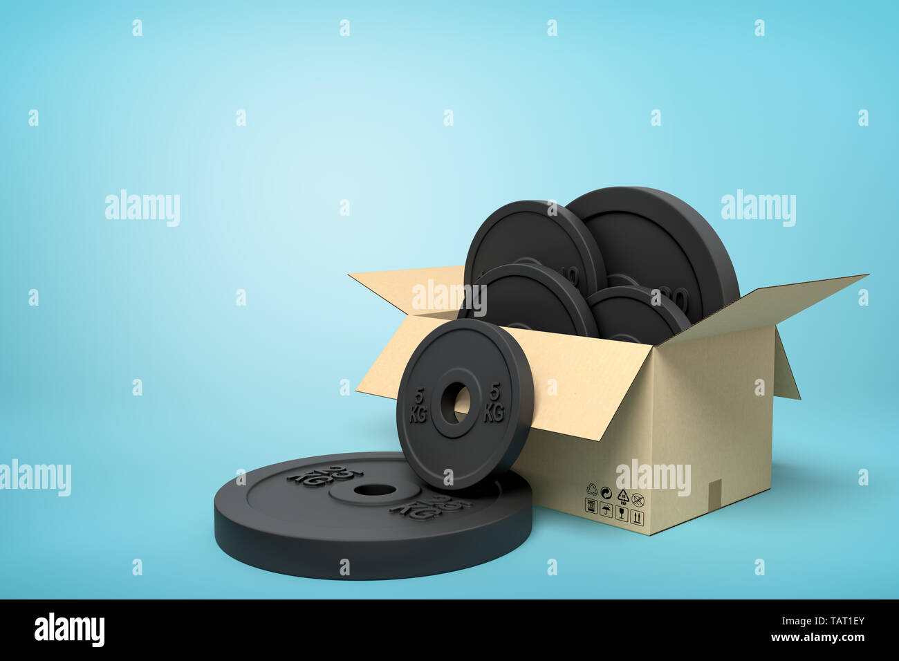 3d rendering of cardboard box full of black weight plates with two plates outside on light-blue background. Stock Photo