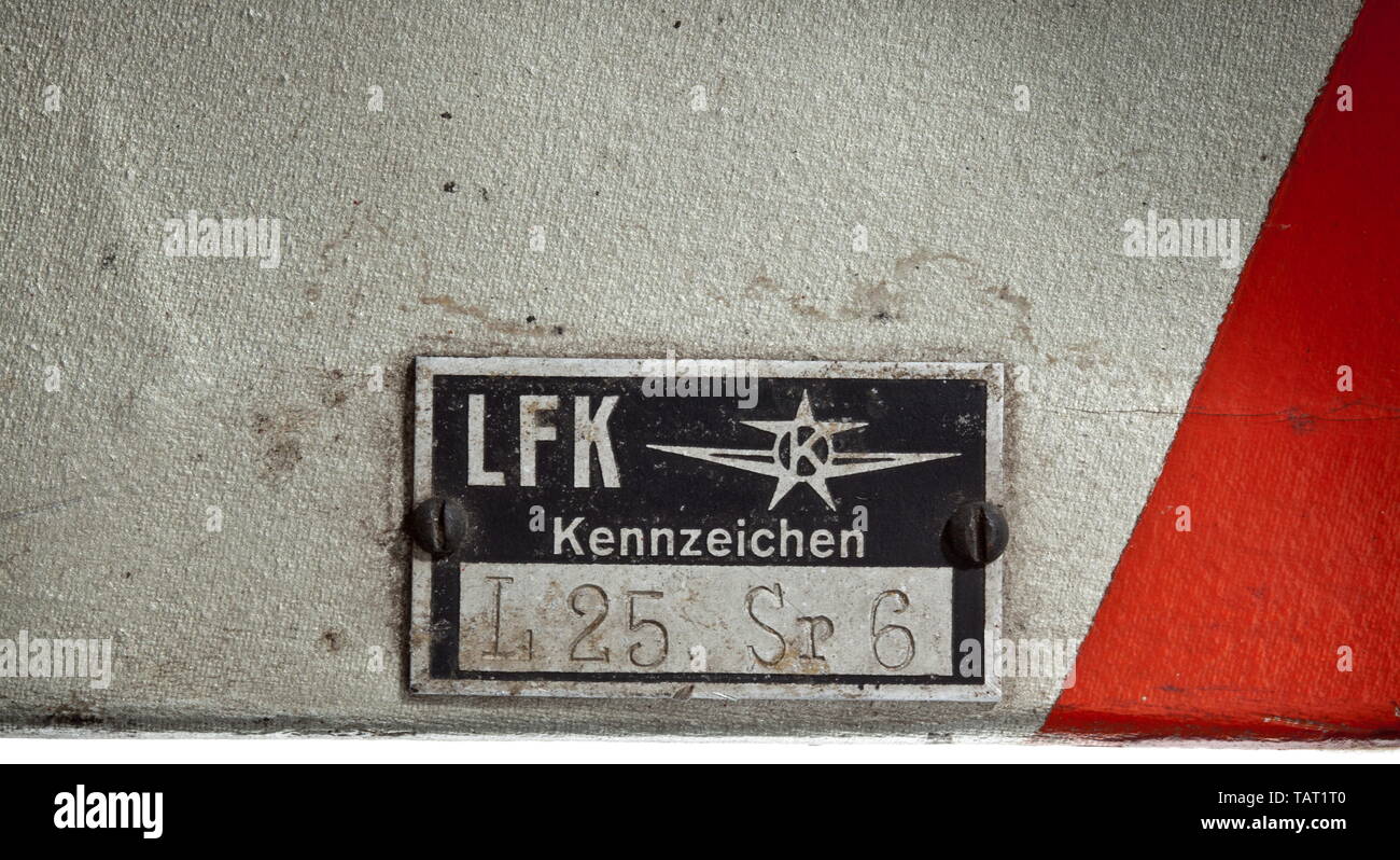 Pilot Georg Resch - a movable empennage of the Klemm 25 with registration 'D-ENIP', Lightweight rudder with original finish. At top the emblem of the Klemm aircraft company, at centre a swastika on white ground and red banner. At bottom the inscription 'Georg Resch, München Tal 33.' At the side a plaque with type specifications 'LFK Kennzeichen - L 25 Sr 6', mounted parts. Dimensions circa 130 x 100 x 33 cm. The Klemm 25, later Kl 25, was produced by the German aircraft manufacturer Klemm GmbH. Only very few planes of this type are existent and functioning today. The Kl 25 , Editorial-Use-Only Stock Photo