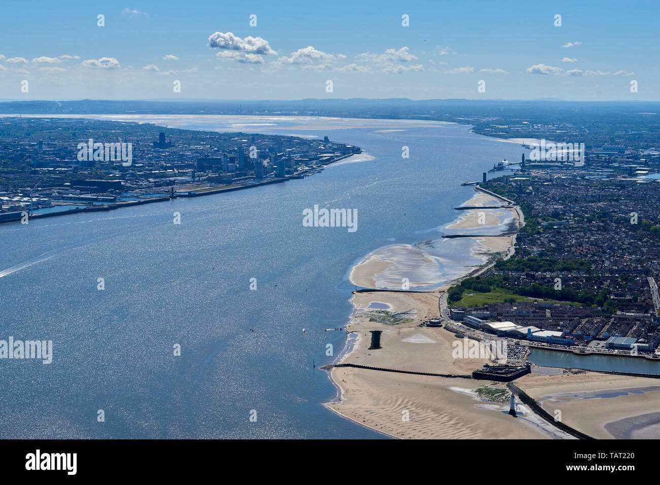 An aerial view looking up the river Mersey, Liverpool left and Birkenhead right, North West England, UK Stock Photo