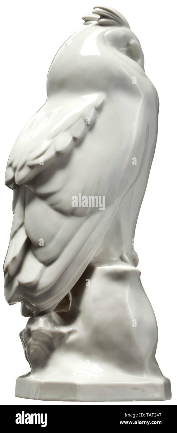 A long-eared owl, Design by Wilhelm Neuhäuser, model number 85. White glazed porcelain. On the underside press mark 'SS Allach' within an octagon set between the impressed model number below and the impressed artist's signature 'Neuhäuser' above. Height ca. 25 cm. According to Porell, Allach Porcelain, vol. 2, p. 379, only 54 such owls were manufactured in 1938/39. Extremely rare figure. porcelain, chinaware, historic, historical 20th century, Editorial-Use-Only Stock Photo