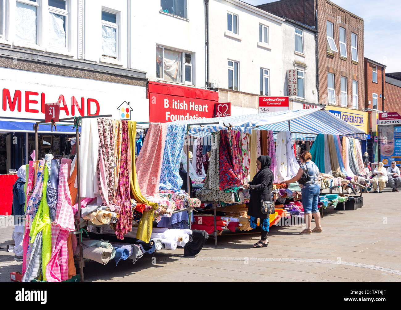 Textile cloth stall, West Bromwich Market, High Street, West Bromwich, West Midlands, England, United Kingdom Stock Photo