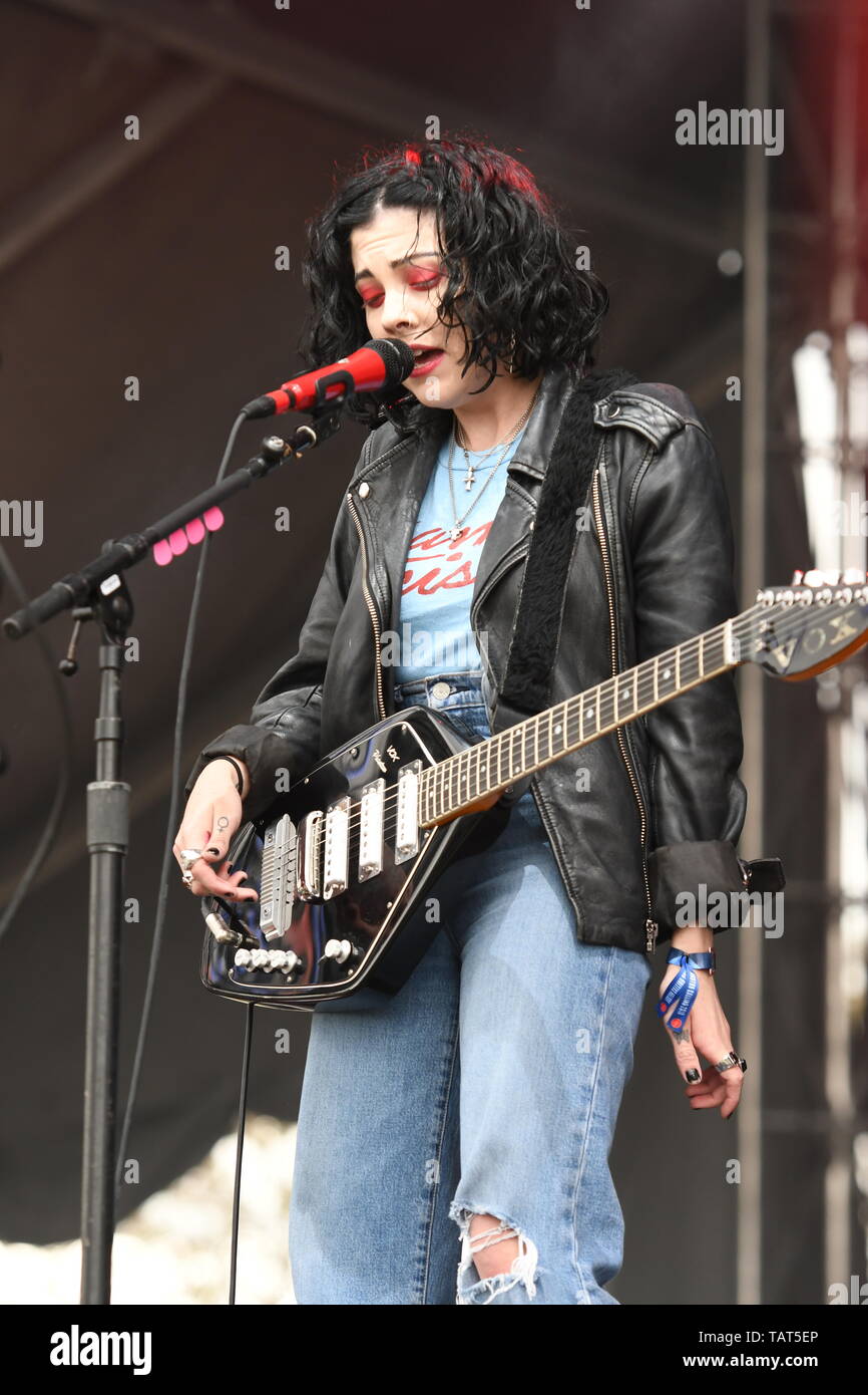 Singer, songwriter and guitarist Heather Baron-Gracie is shown performing on stage during a 'live' stand up appearance with the Pale Waves. Stock Photo