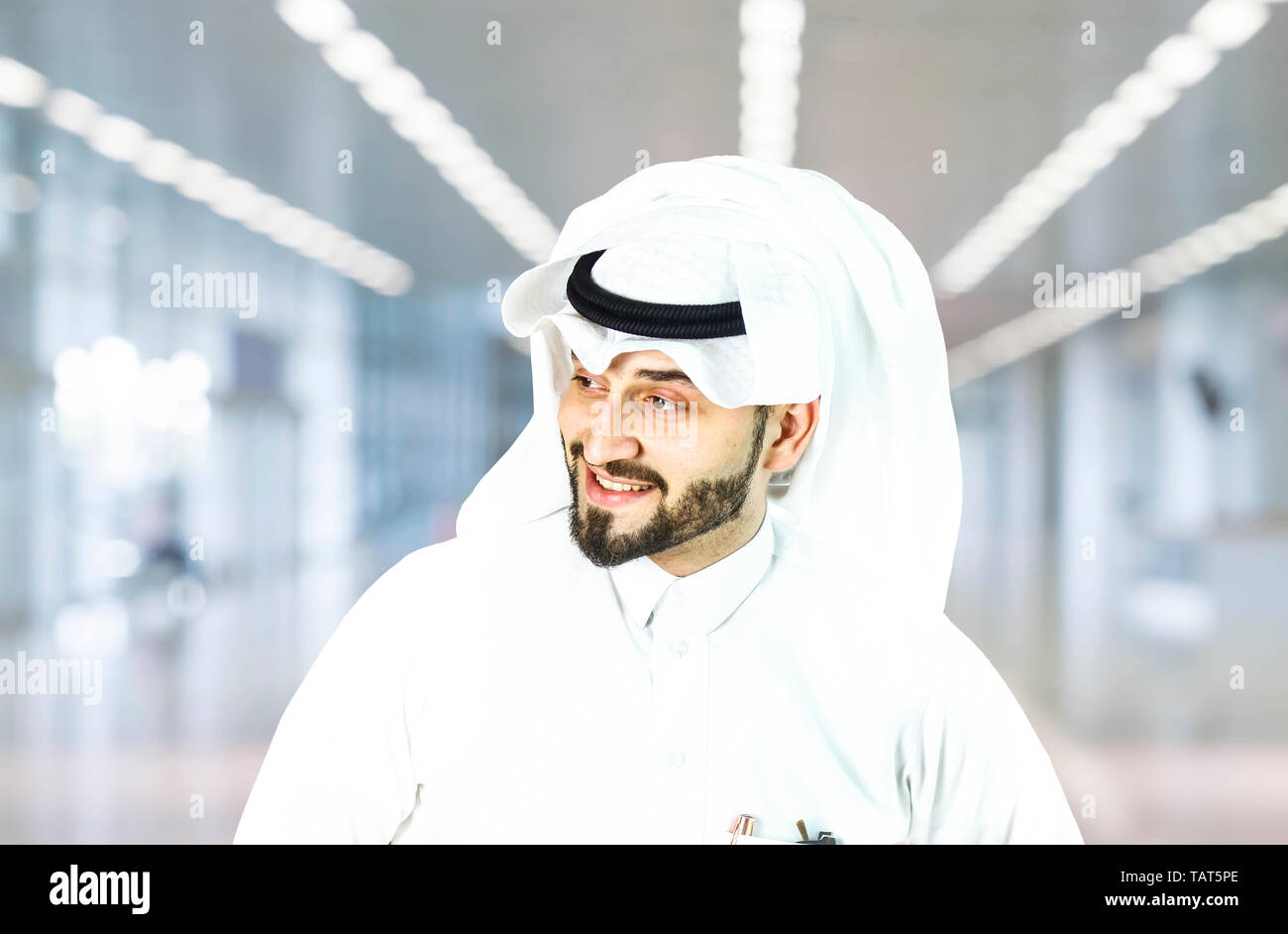 Arabian (Gulf area) smiling man with traditional wear. Stock Photo