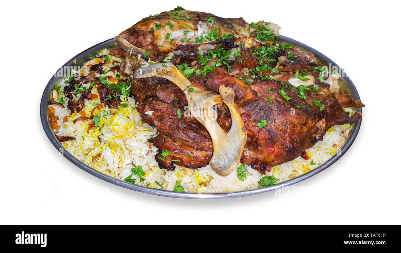 Mandi is a traditional dish from Yemen of meat, rice, and spices. It is now very popular in other areas of the Arabian Peninsula. Stock Photo