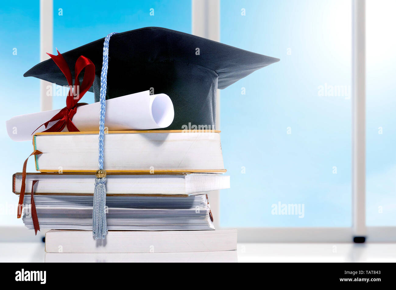 Graduation Rites Book Graduation ceremony book hat certificate hi-res stock photography and ...