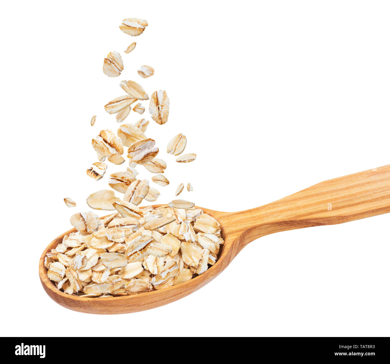 Isolated oatmeal, oat flakes in spoon, oat flakes isolated on white background with clipping path Stock Photo