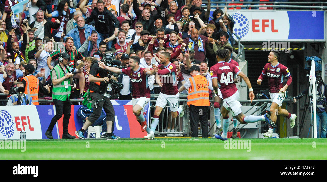 John McGinn of Aston Villa (left) leads the celebrations after scoring  their second goal during the EFL Sky Bet Championship Play-Off Final match  between Aston Villa and Derby County at Wembley Stadium ,