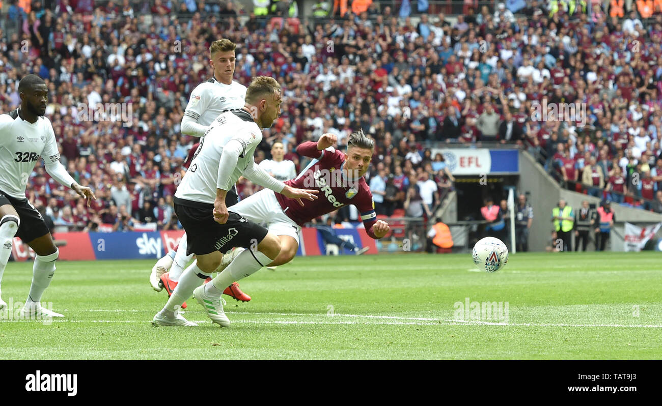 Jack Grealish of Aston Villa has a shot blocked during the EFL Sky Bet  Championship Play-Off Final match between Aston Villa and Derby County at Wembley Stadium , London , 27 May 2019 Editorial use only. No merchandising. For Football images FA and Premier League restrictions apply inc. no internet/mobile usage without FAPL license - for details contact Football Dataco Stock Photo