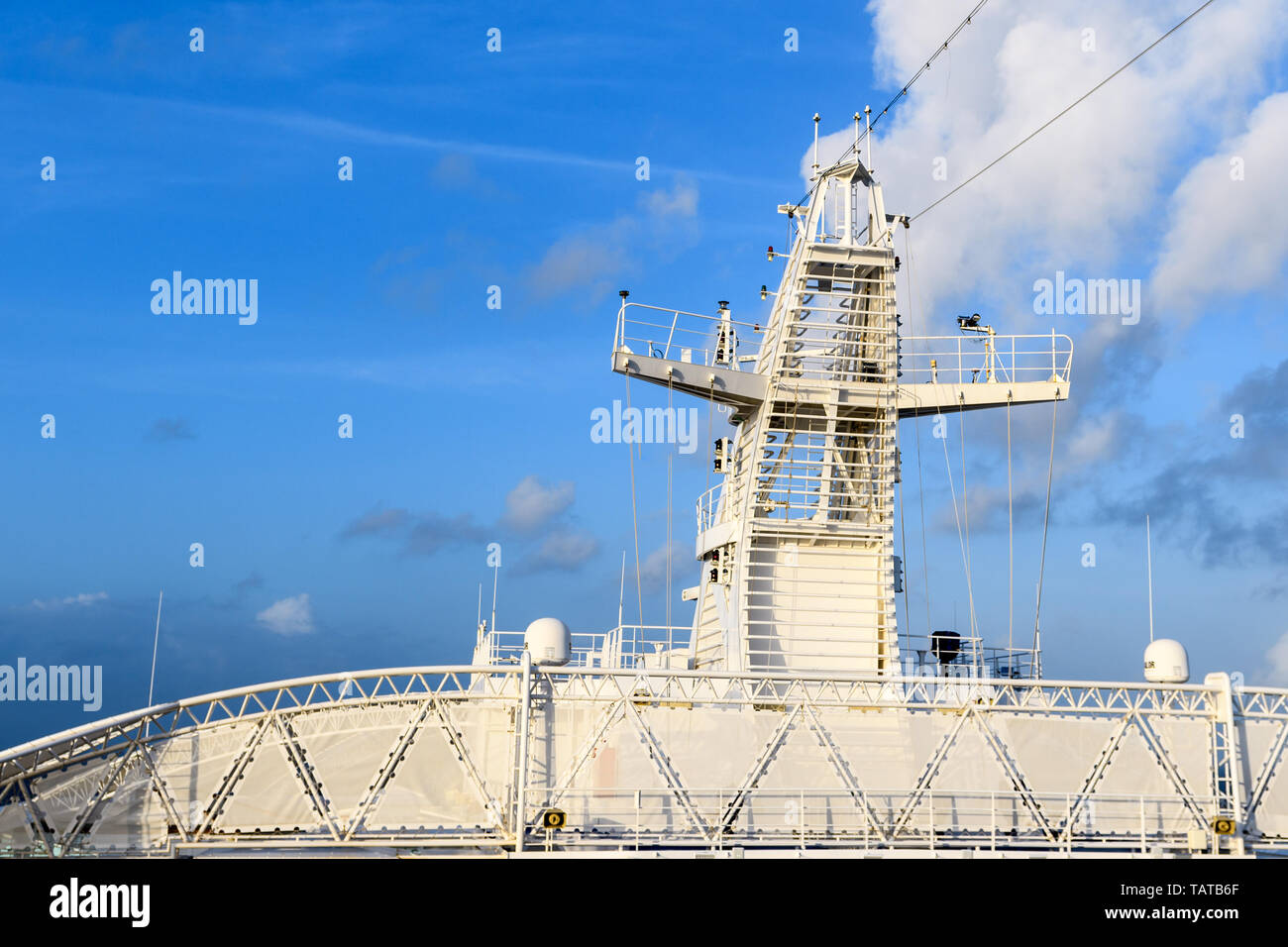 Navigation radar installations of the ship against the blue sky Stock Photo