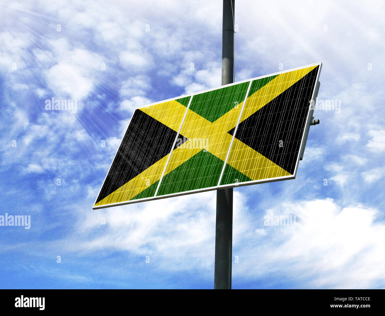 Solar panels against a blue sky with a picture of the flag of Jamaica