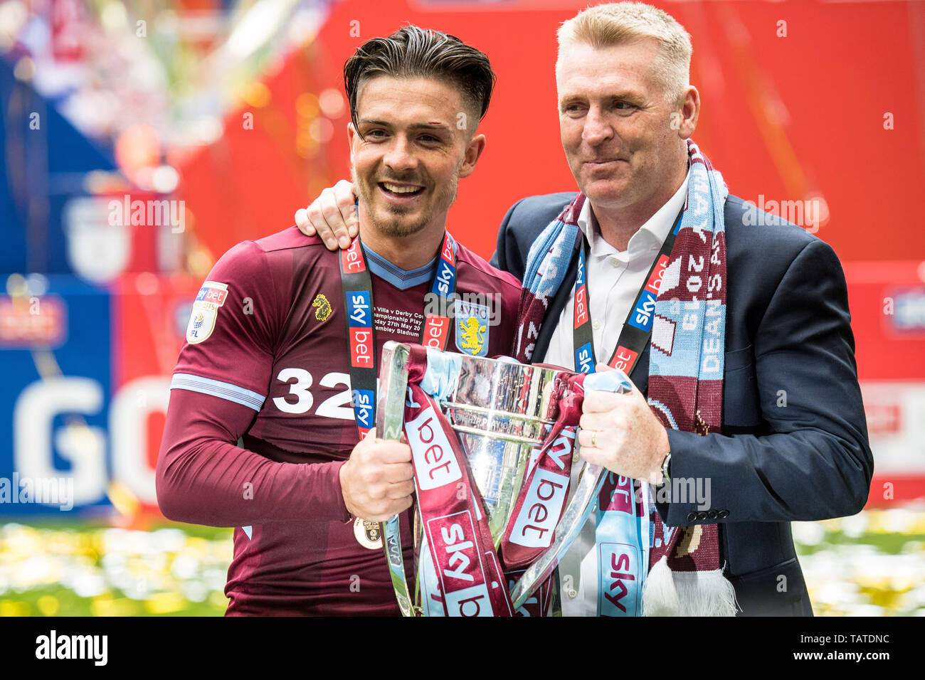 LONDON, ENGLAND - MAY 27: Jack Grealish and manager Dean Smith of Aston Villa lifts the trophy during the Sky Bet Championship Play-off Final match between Aston Villa and Derby County at Wembley Stadium on May 27, 2019 in London, United Kingdom. (Photo by Sebastian Frej/MB Media) Stock Photo
