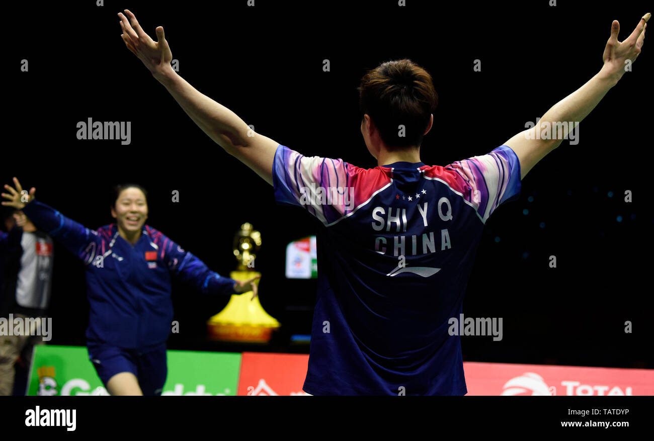 Shi Yuqi of China celebrates after defeating Kento Momota of Japan in their final group 1 match of Men's Singles during the TOTAL BWF Sudirman Cup 2019 at the Guangxi Sports Center Gymnasium in Nanning city, south China's Guangxi Zhuang Autonomous Region, 26 May 2019.  Shi Yuqi defeated Kento Momota 2-1 (15-21, 21-5, 21-11). Stock Photo