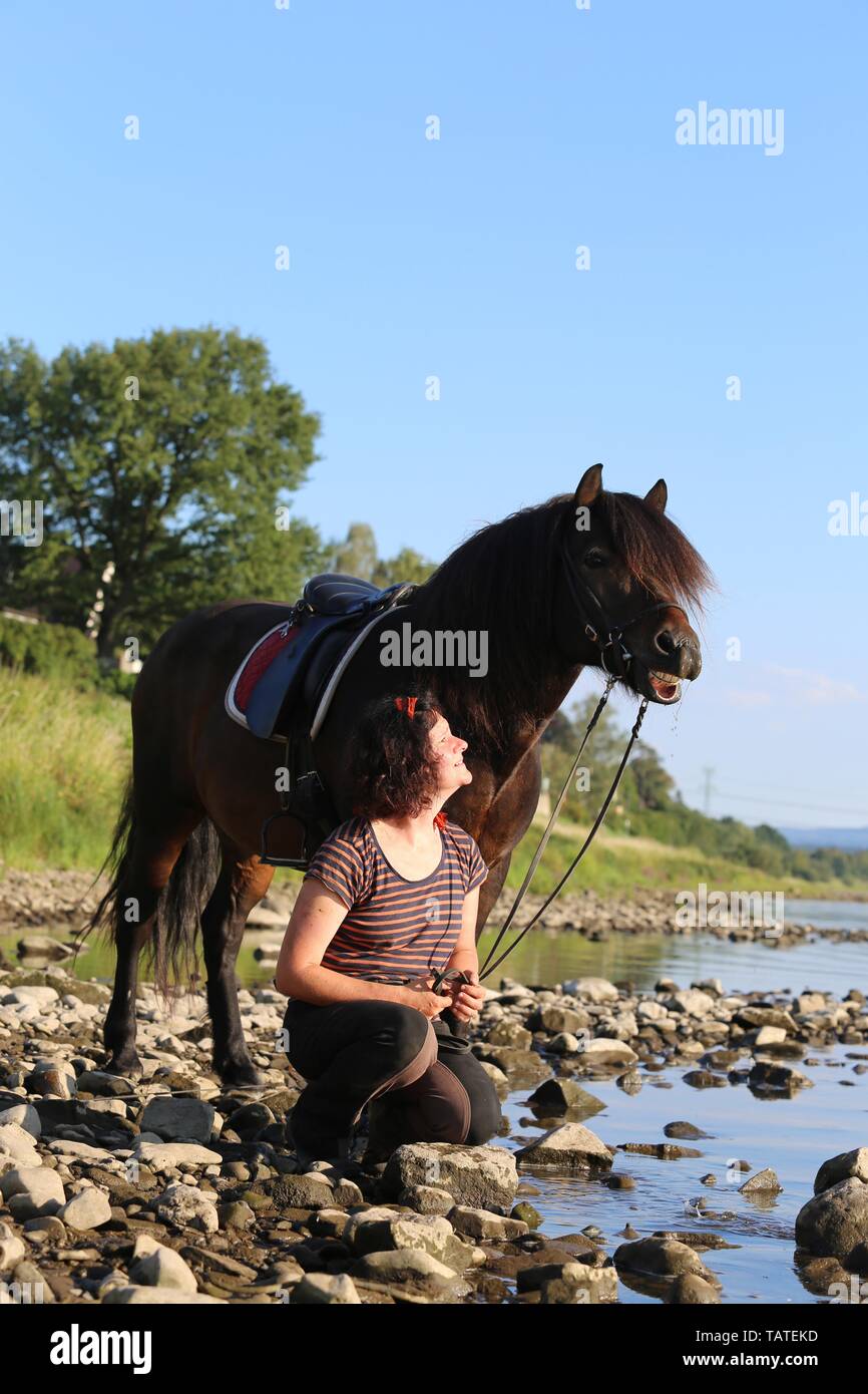 woman and Icelandic Horse Stock Photo