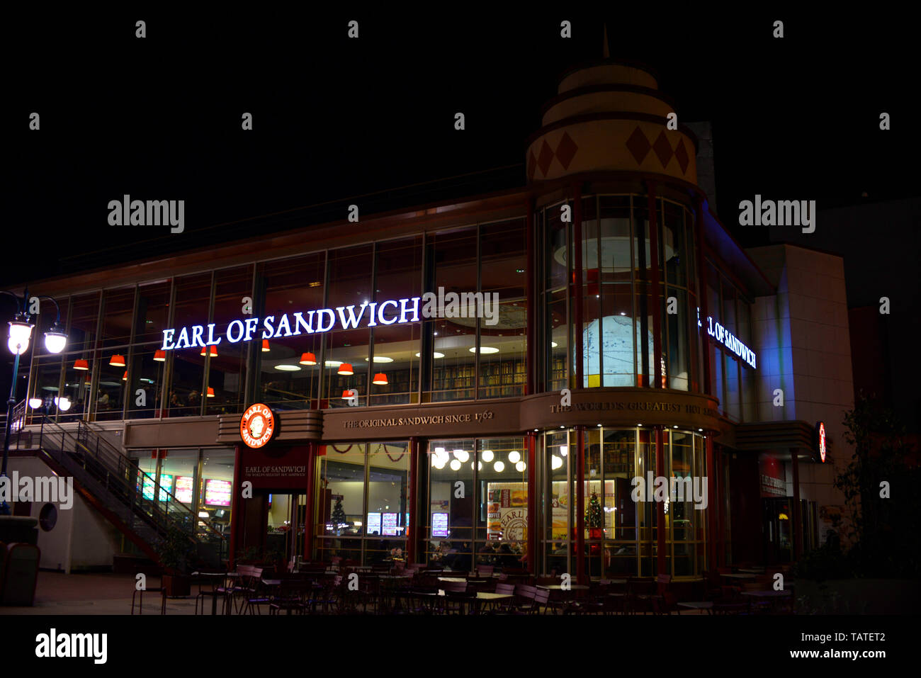 Earl of Sandwich fast food restaurant at Disneyland Paris resort at night. Fast food establishment, eatery on the resort Stock Photo