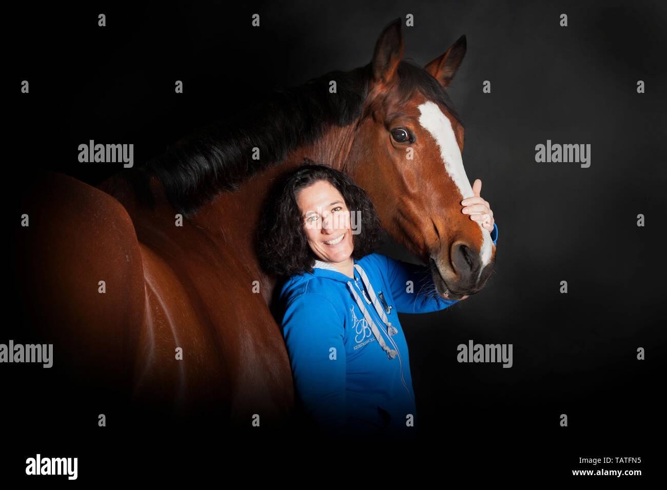 woman and Polish Warmblood Stock Photo