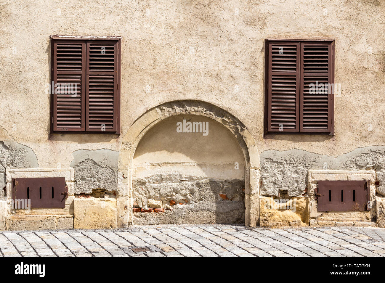 Closed window blind on Medieval house Stock Photo