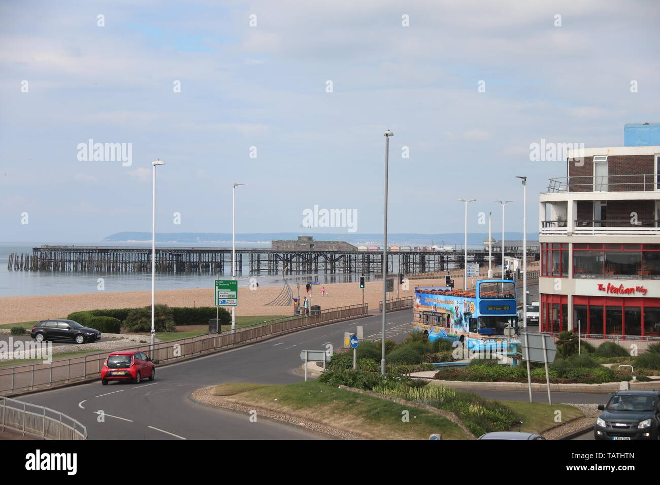 VIEW OF SEAFRONT IN THE SEASIDE RESORT OF HASTINGS SHOWING SEA, PIER