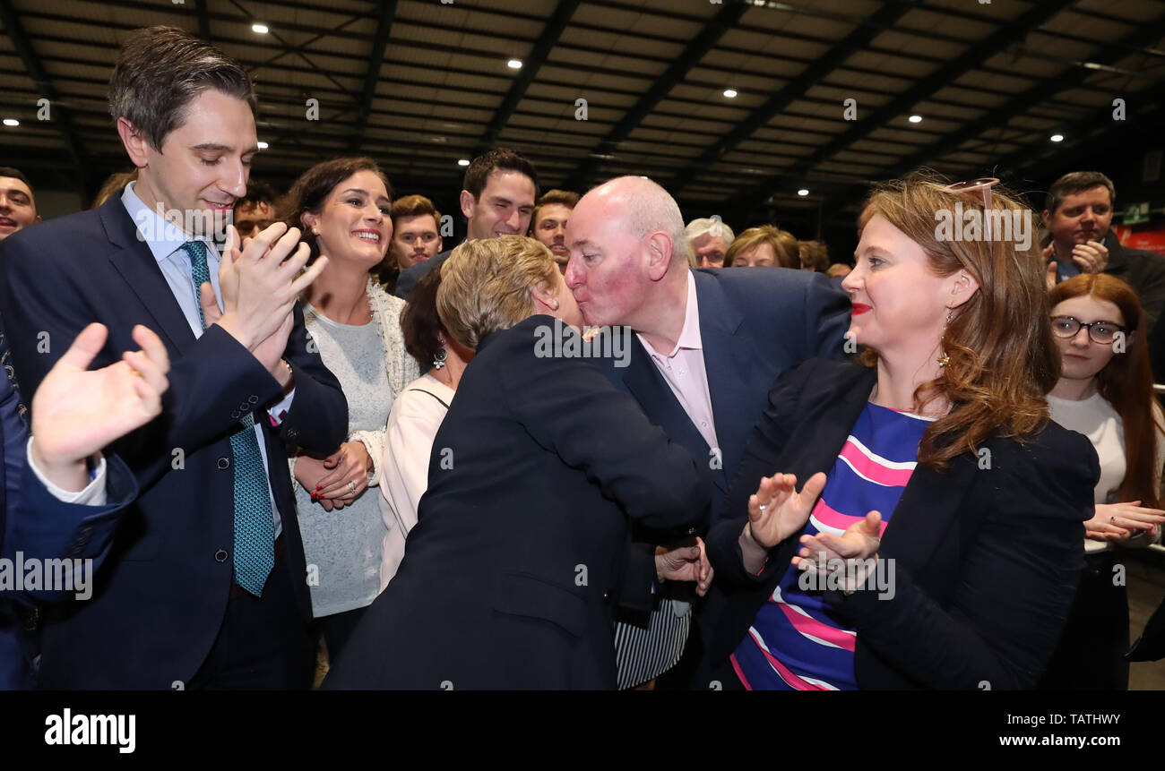 Fine Gael's Francis Fitzgerald is kissed by her running mate Mark Durkan as she is elected as an MEP in the Dublin constituency of the European election at the RDS in Dublin. Stock Photo