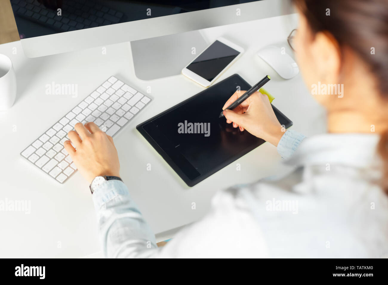 Designer Using Tablet Photography artist using graphic tablet hi-res stock photography and ...