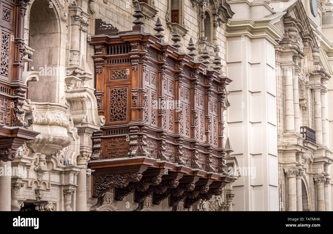 Beautiful Wood Carved Decorative Balcony of the Archbishop Palace of Lima, Plaza Mayor, Lima, Peru, South America Stock Photo