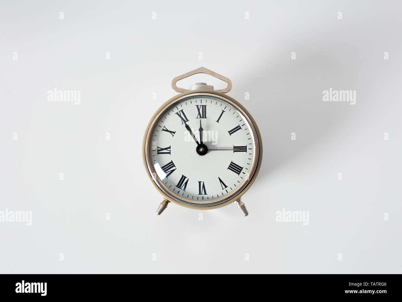 Alarm clock on white background Stock Photo - Alamy