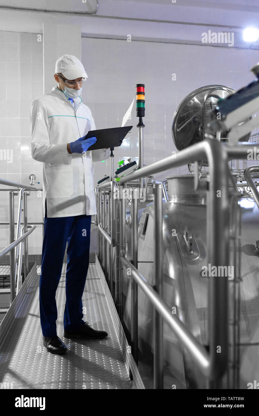 Inspecting food production line hi-res stock photography and images - Alamy