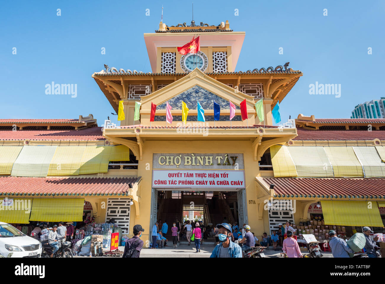 Ho Chi Minh City, Vietnam - April 15, 2019: the exterior of the central entrance and the tower of Cho Binh Tay market in Cho Lon (Cholon), a Chinatown Stock Photo