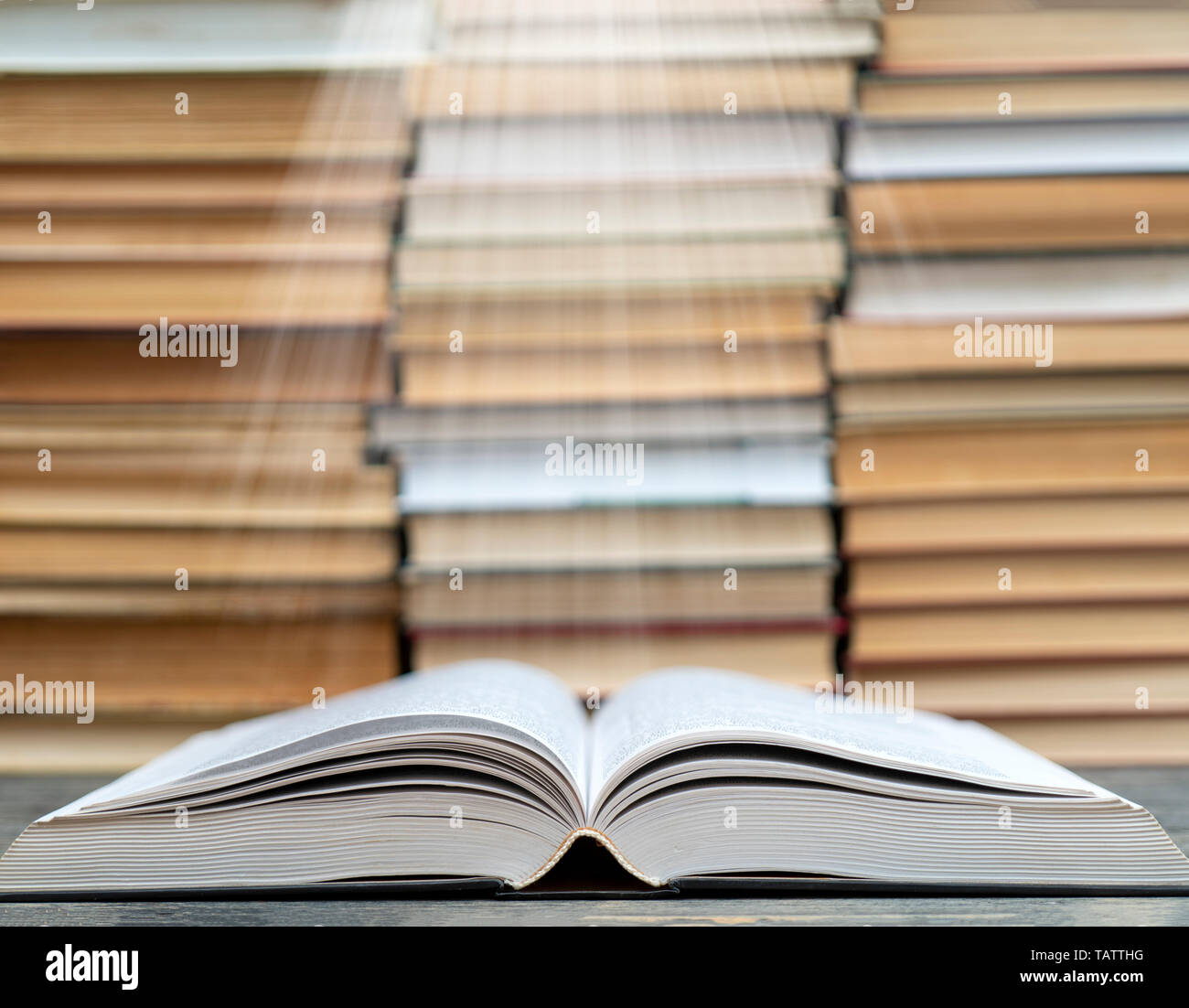Book pages emit light. Symbol of wisdom, knowledge and learning Stock