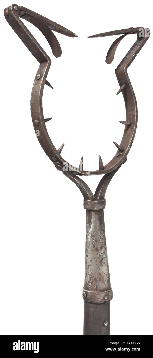 A man catcher, historicism in the style of the 16th/17th century, Iron, round ring with two spring-loaded catches and eight riveted spikes on the inside. The conical socket held by two clamps on a blackened, slightly bent wooden haft. Length 163.5 cm instrument of torture, torture device, instruments of torture, torture devices, object, objects, stills, clipping, clippings, cut out, cut-out, cut-outs, historic, historical 19th century, Additional-Rights-Clearance-Info-Not-Available Stock Photo