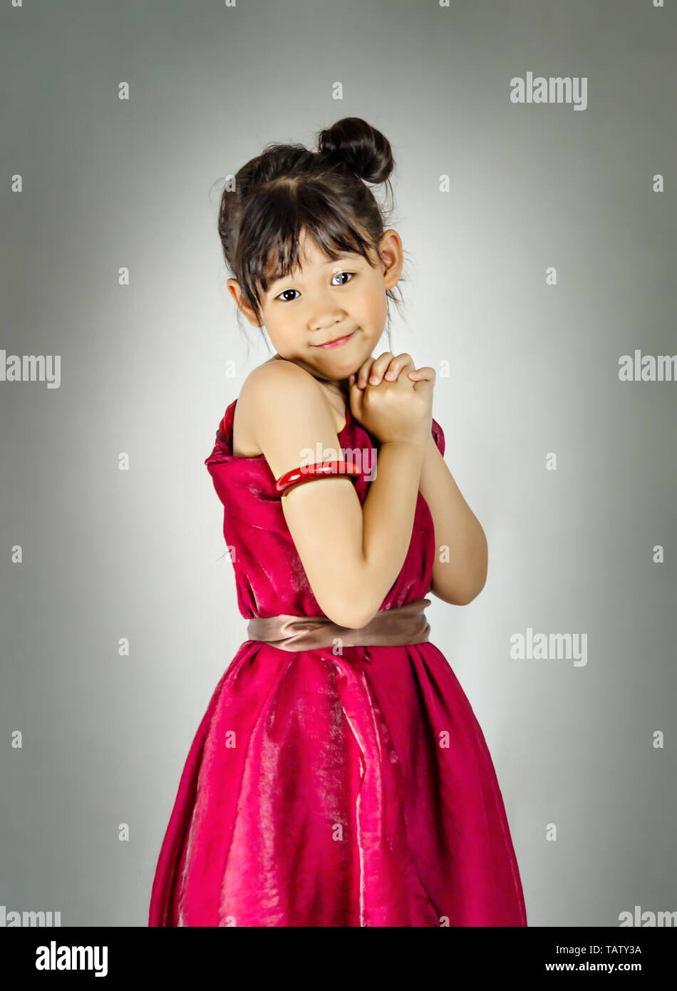 Portrait of asian little girl in red dress Stock Photo - Alamy