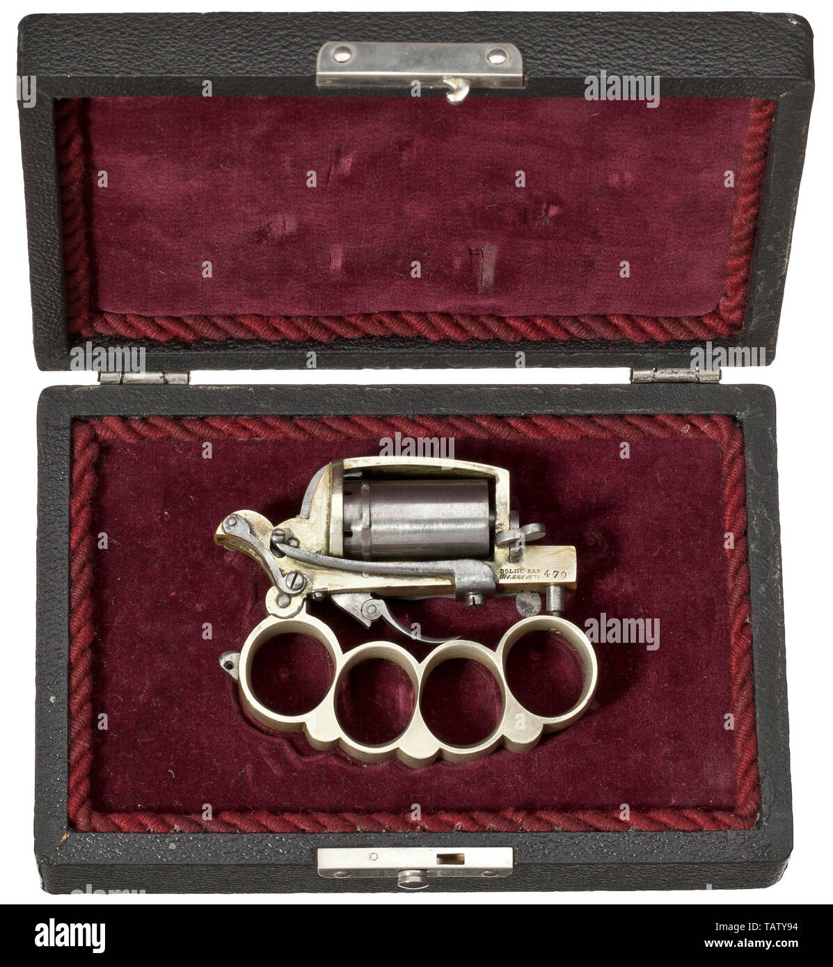 An 'Apache' revolver, Dolne System, in its case, circa 1870, A combination of revolver, waved dagger and knuckleduster. In rare calibre 5 mm SF. no. 470. Front right of frame signed 'DOLNE-BAR / INV.BREVETE 470'. Produced in Liège. Double action. Early model with unfluted, six-shot cylinder. Folding trigger. Steel cylinder, dagger, trigger, fittings and screws, without finish. Nickel frame and knuckleduster, partially few spots. Very good overall condition of a rare collector's item. Gentle cleaning may improve appearance. Comes in black, later i, Additional-Rights-Clearance-Info-Not-Available Stock Photo