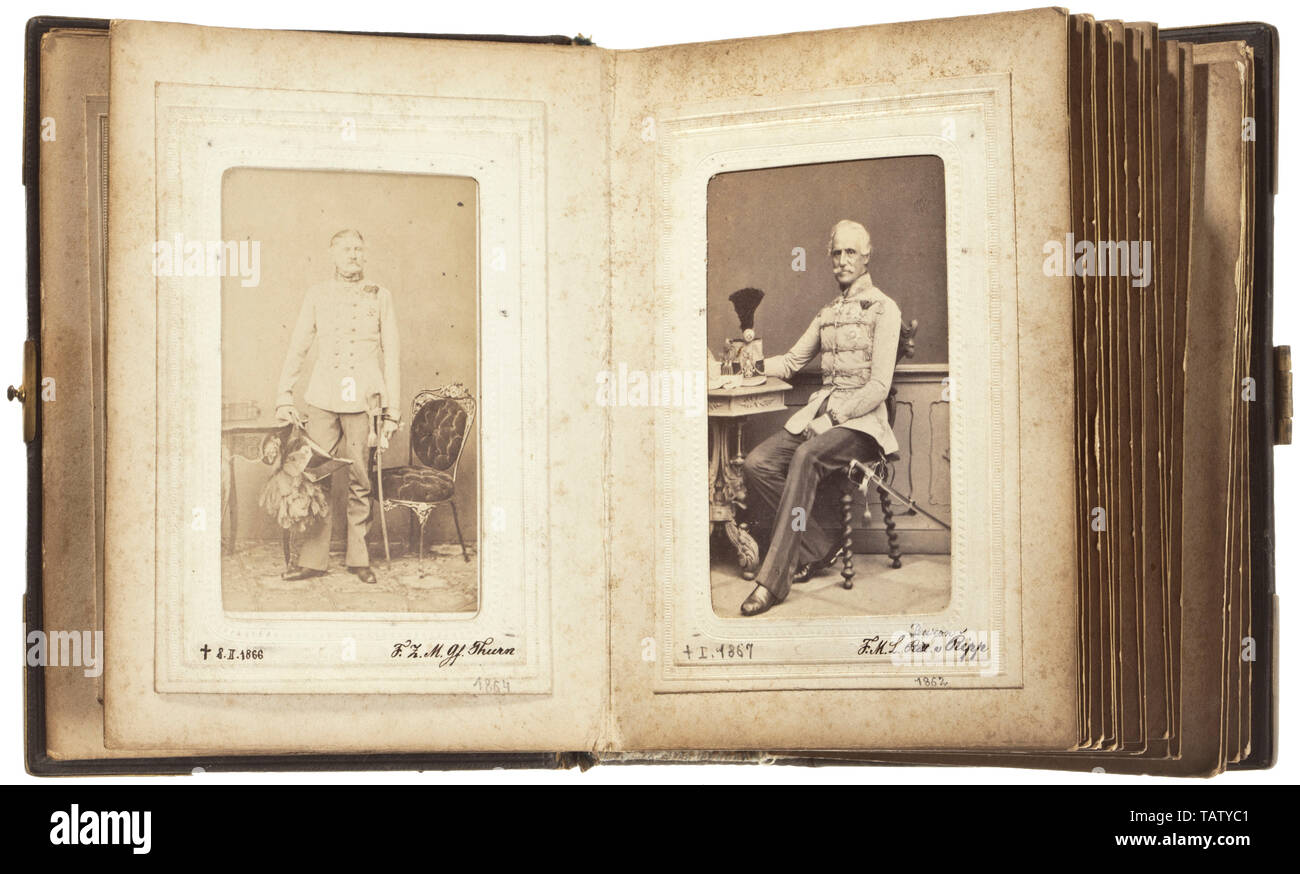 Two photograph albums with carte de visite photographs of the Austrian army and aristocracy 1864 - 1866, Albums with leather binding, brass fittings and clasps, pages and cover binding partly loosened or torn. Most album pages with names, ranks and dates on which the pictures were taken. Approximately 98 photographs in total (format circa 6 x 9 cm, various photo studios), many of them showing lieutenant field marshals, high-ranking officers and members of the Austrian and Prussian aristocracy. Names such as Prince Friedrich Carl of Prussia, v. Fe, Additional-Rights-Clearance-Info-Not-Available Stock Photo